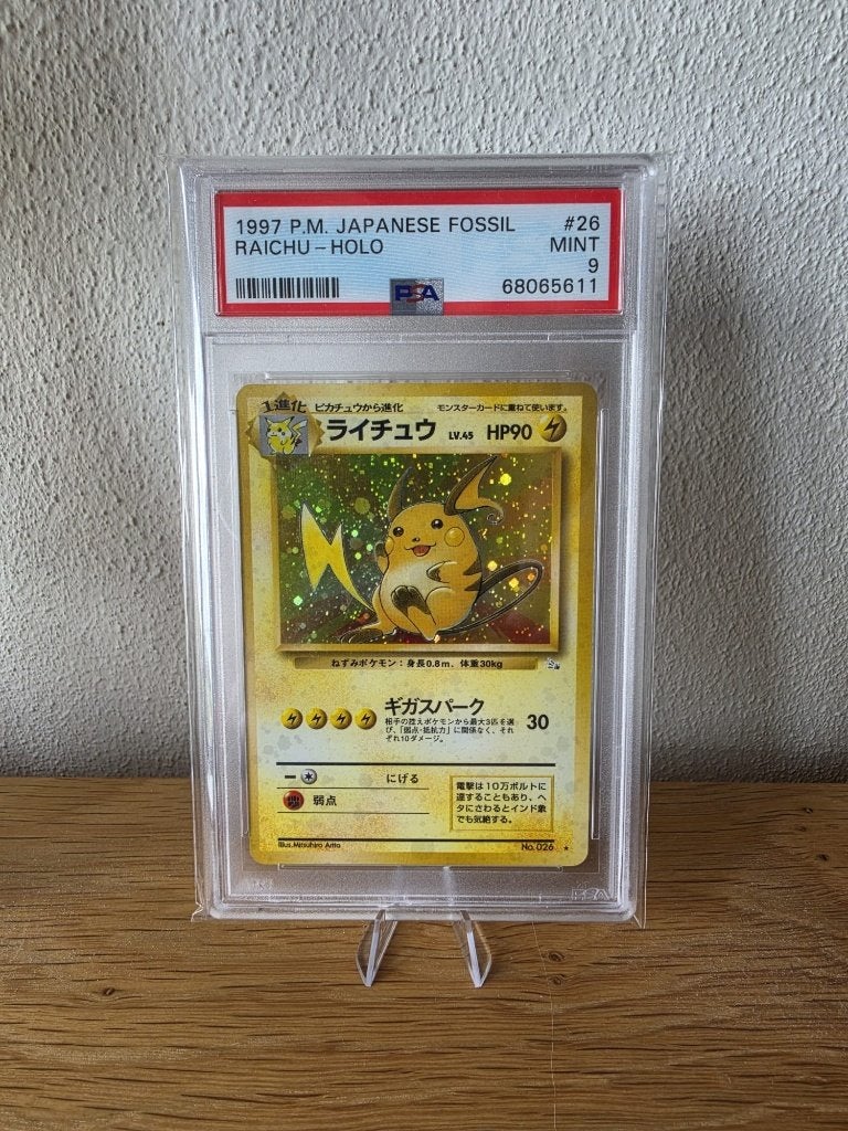 Pokémon Raichu Holo Japanese Fossil 1997 PSA 9 MINT - No.026, Ophalen of Verzenden, Zo goed als nieuw, Losse kaart, Foil