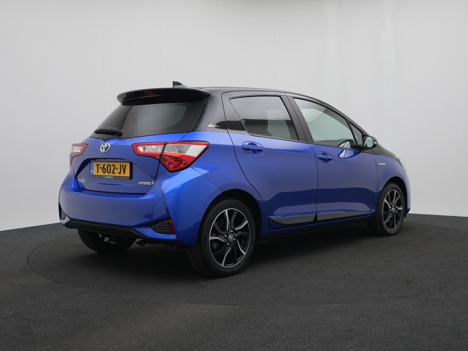 Toyota Yaris 1.5 Hybrid Bi-Tone | Achteruitrijcamera | Clima, Auto's, 12 maanden, Euro 6, 4 cilinders, Blauw