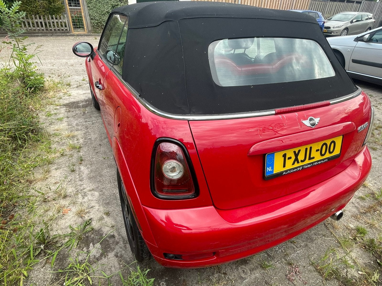 Mini Cooper Cabrio 1.6 120pk 2009 Rood, Auto's, Stof, Zwart, 4 cilinders, Cabriolet