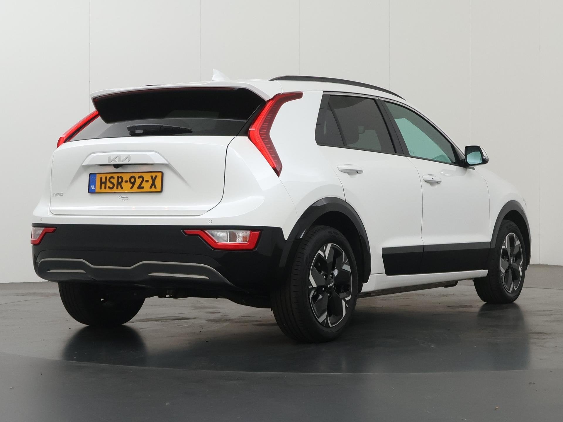 Kia Niro EV Light Advanced 64.8 kWh | Stoel / Stuurwielverwa, Auto's, Kia, Gebruikt, 750 kg, 1657 kg, Leder en Stof