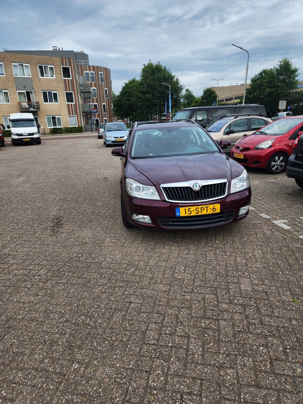 Skoda Octavia 1.2 TSI Combi 2011 Rood, Auto's, Voorwielaandrijving, Euro 5, Stof, Zwart