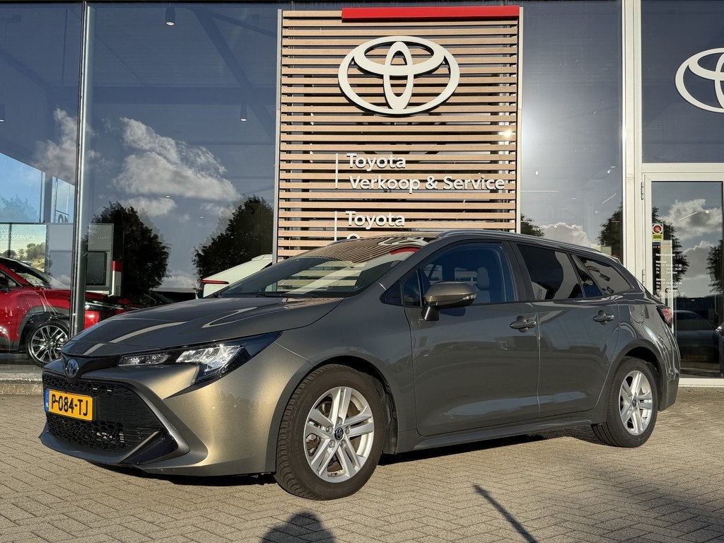 Toyota Corolla Touring Sports 1.8 Hybrid Active Automaat 122, Auto's, Toyota, Gebruikt, 4 cilinders, Corolla, 122 pk