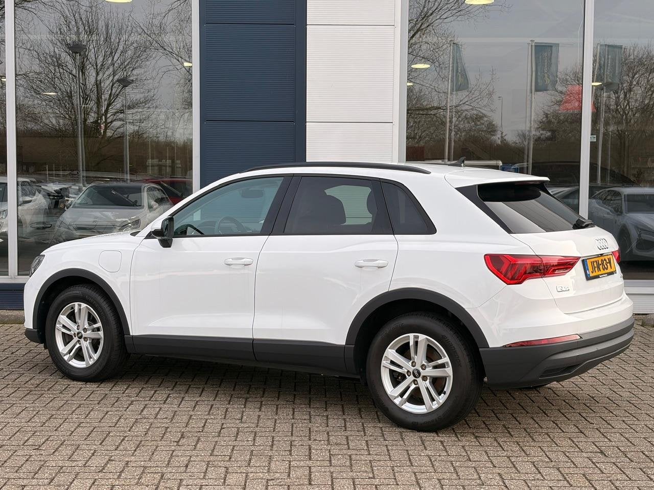 Audi Q3 45 TFSI 245pk PHEV S-tronic Automaat | Navigatie | C, Auto's, Stof, Gebruikt, Wit, Cruise Control