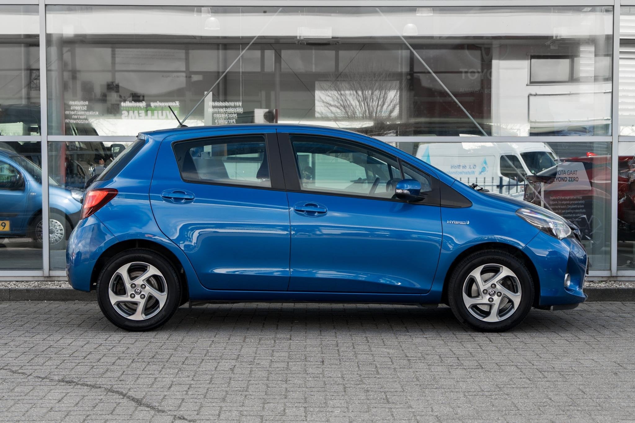 Toyota Yaris 1.5 Hybrid Trend, Auto's, Gebruikt, Euro 6, 4 cilinders, Blauw