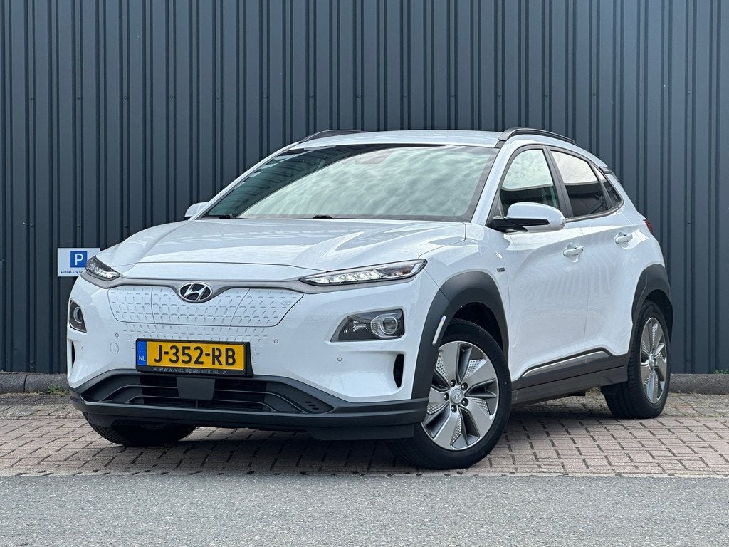 Hyundai Kona EV Premium 64 kWh| SOH 100% | WARMTEPOMP | FASE, Auto's, Hyundai, Automatische klimaatregeling, Gebruikt, Zwart, 174 min