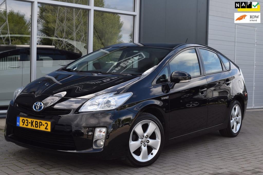 Toyota Prius 1.8 Aspiration | Clima | Cruise | NAP + APK 5-2, Stof, Gebruikt, Zwart, 4 cilinders