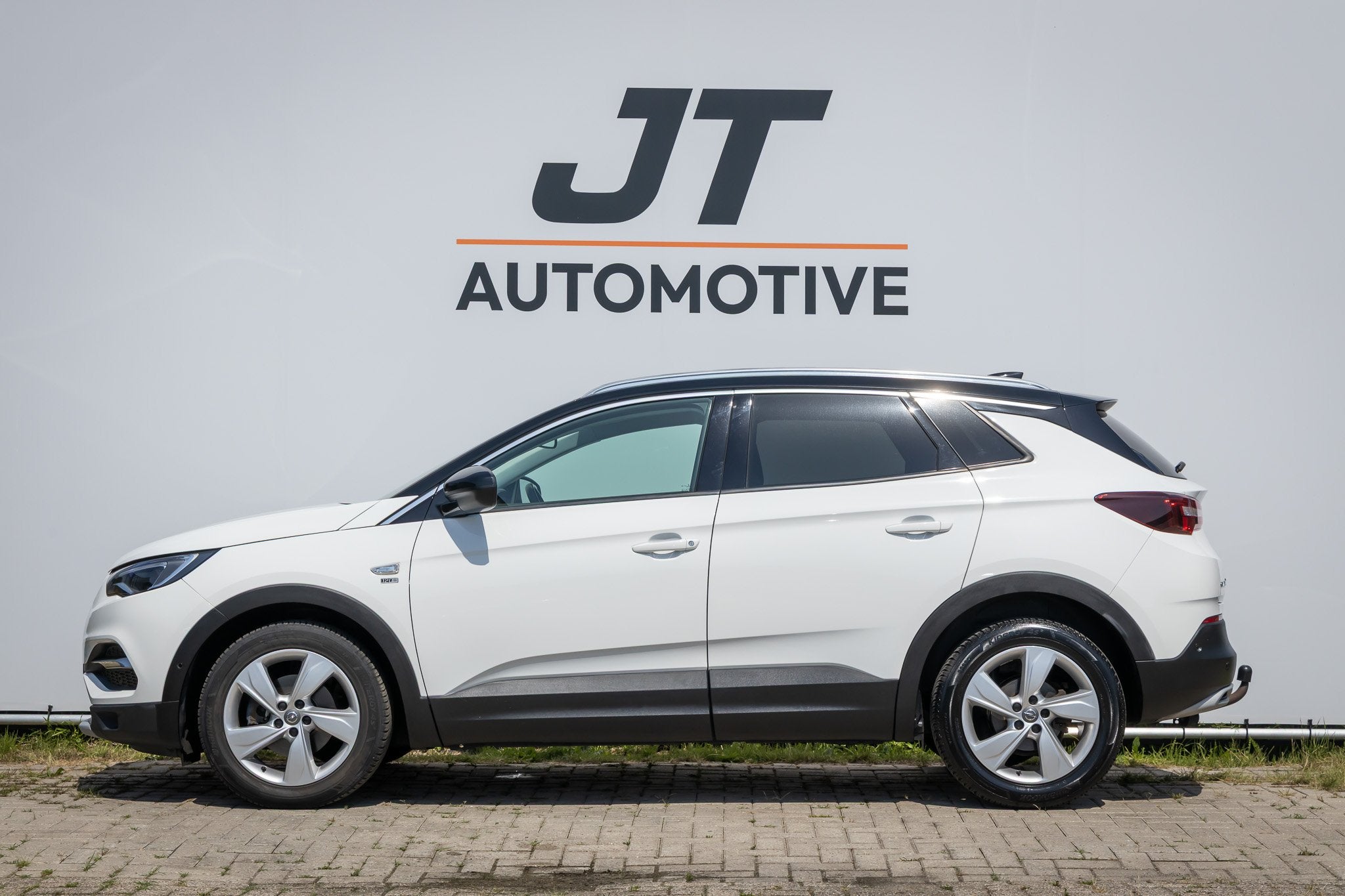 Opel Grandland X 1.2 Turbo 120 jaar edition Trekhaak | Stoel, Auto's, Gebruikt, Euro 6, 1199 cc, Automatische klimaatregeling