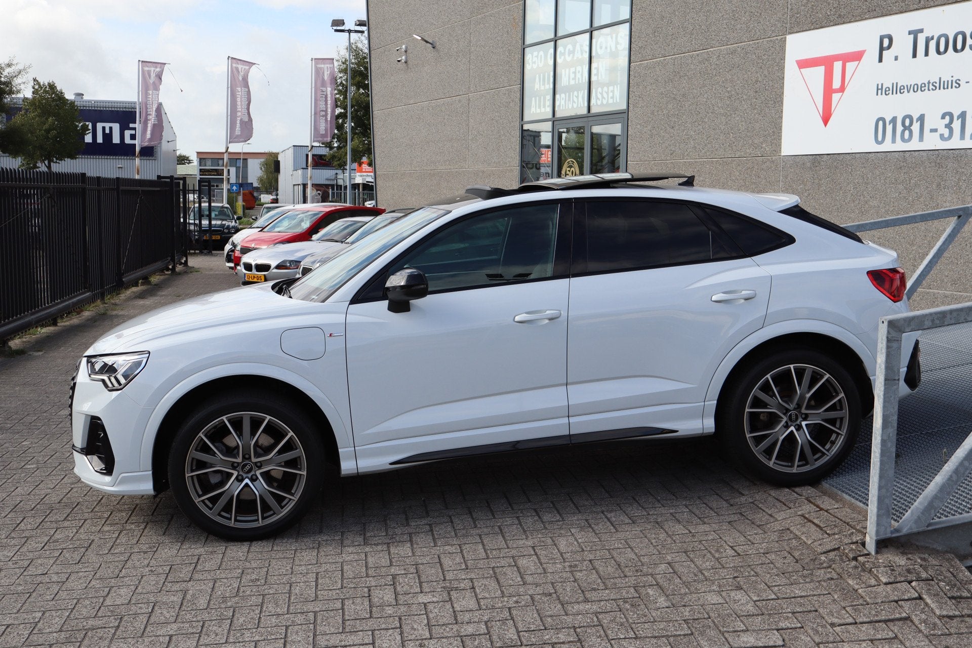 Audi Q3 Sportback 45 TFSI e 3x S-Line/Panoramadak/Stoelverwa, Auto's, Audi, 12 maanden, Gebruikt, Leder en Stof, Wit
