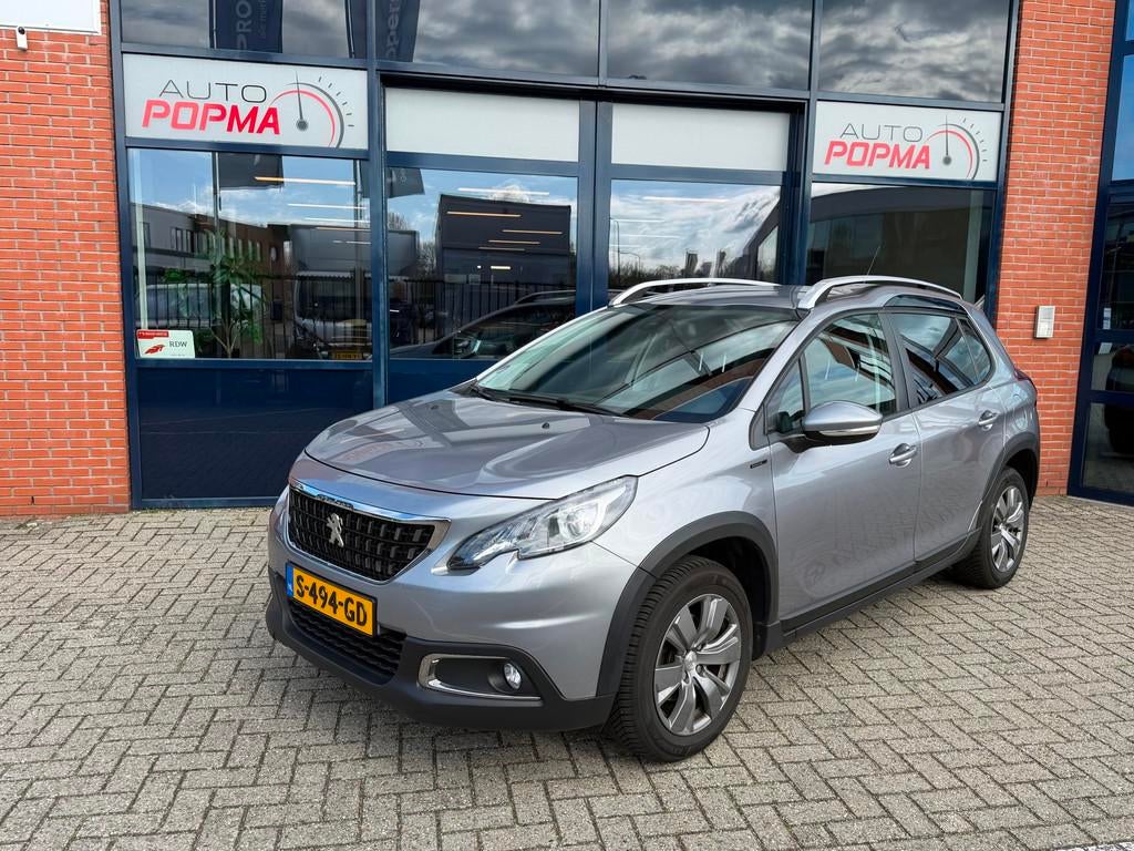 Peugeot 2008 1.2 110pk PureTech Blue Lease Allure / Trekhaak, Auto's, Voorwielaandrijving, Stof, 1199 cc, Bedrijf
