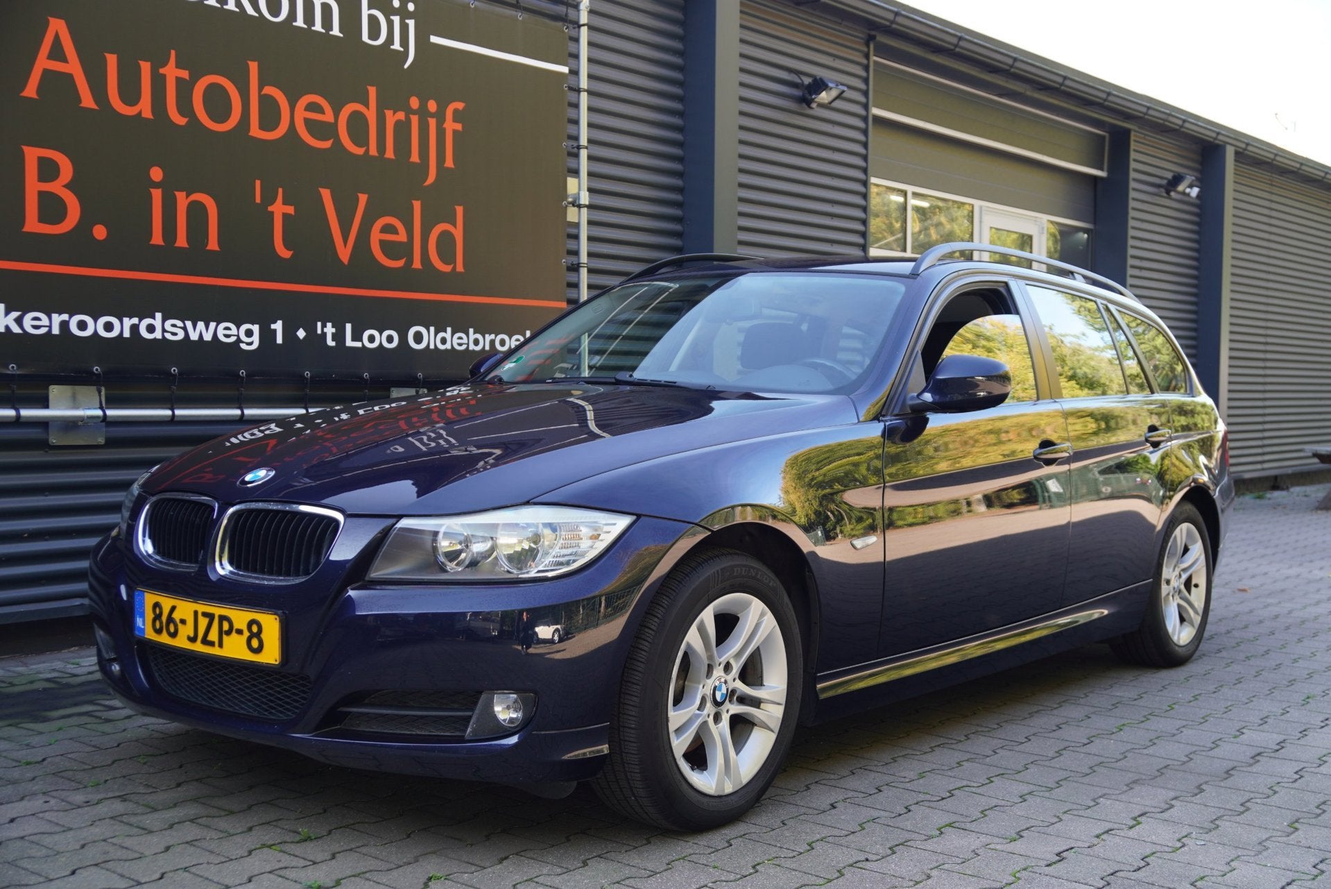 BMW 3-serie Touring 318i Business Line NAVI PROF TREKHAAK PD, Auto's, Zwart, Blauw, Origineel Nederlands, Handgeschakeld