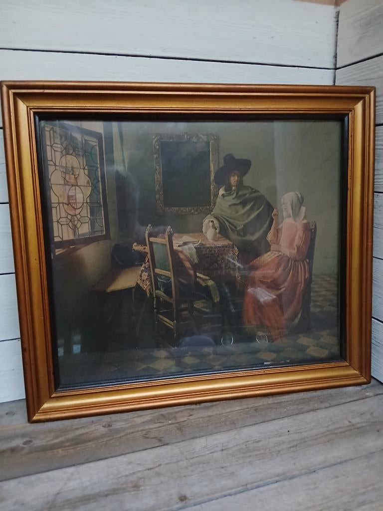 Ingelijste reproductie  "Het glas wijn" Johannes Vermeer., Antiek en Kunst, Ophalen of Verzenden