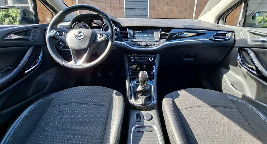 Opel Astra 1.0 Innovation | Bluetooth | NAP | Half lederen b, Auto's, Stof, Gebruikt, Euro 6, 610 kg