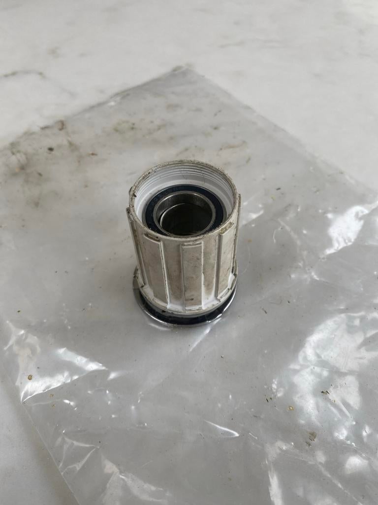 Ongebruikte freehub body - Campognolo Shimano, Fietsen en Brommers, Fietsonderdelen, Gebruikt, Overige typen, Ophalen of Verzenden