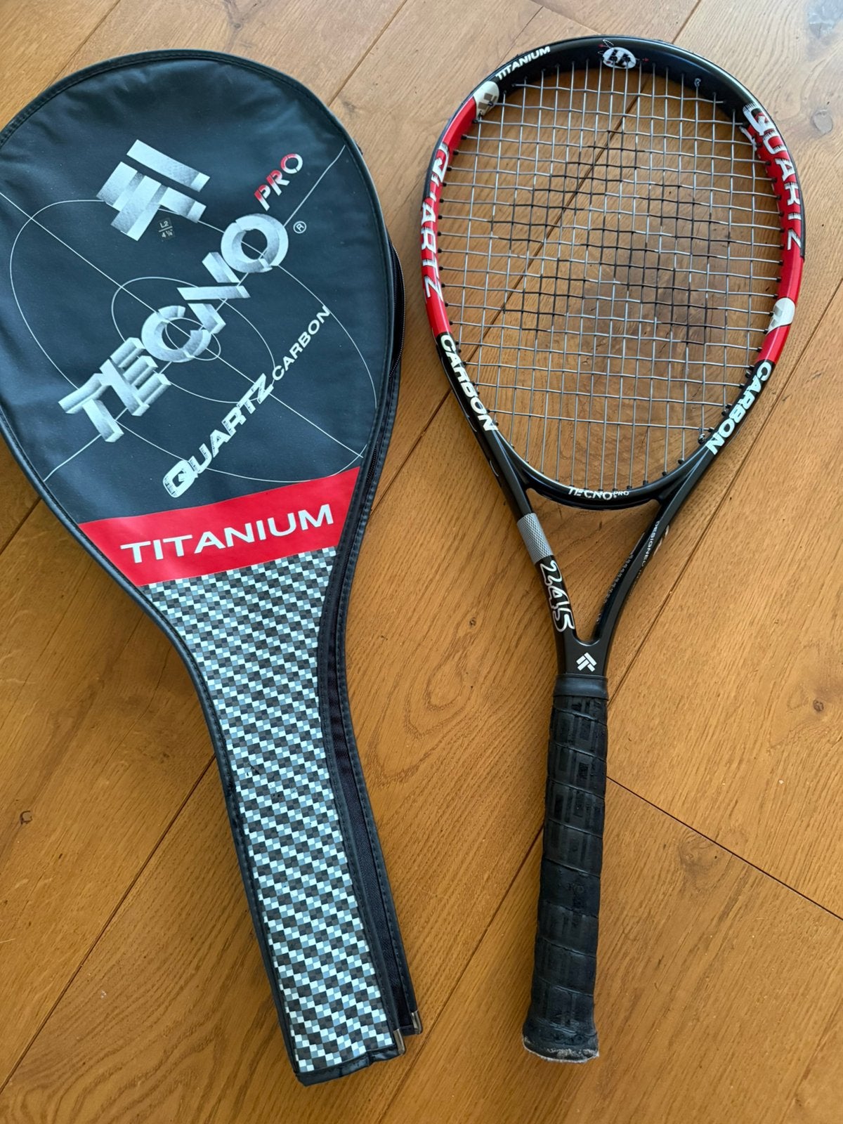 Tecno Titanium racket met opberghoes, Ophalen of Verzenden, Zo goed als nieuw, Racket, Overige merken