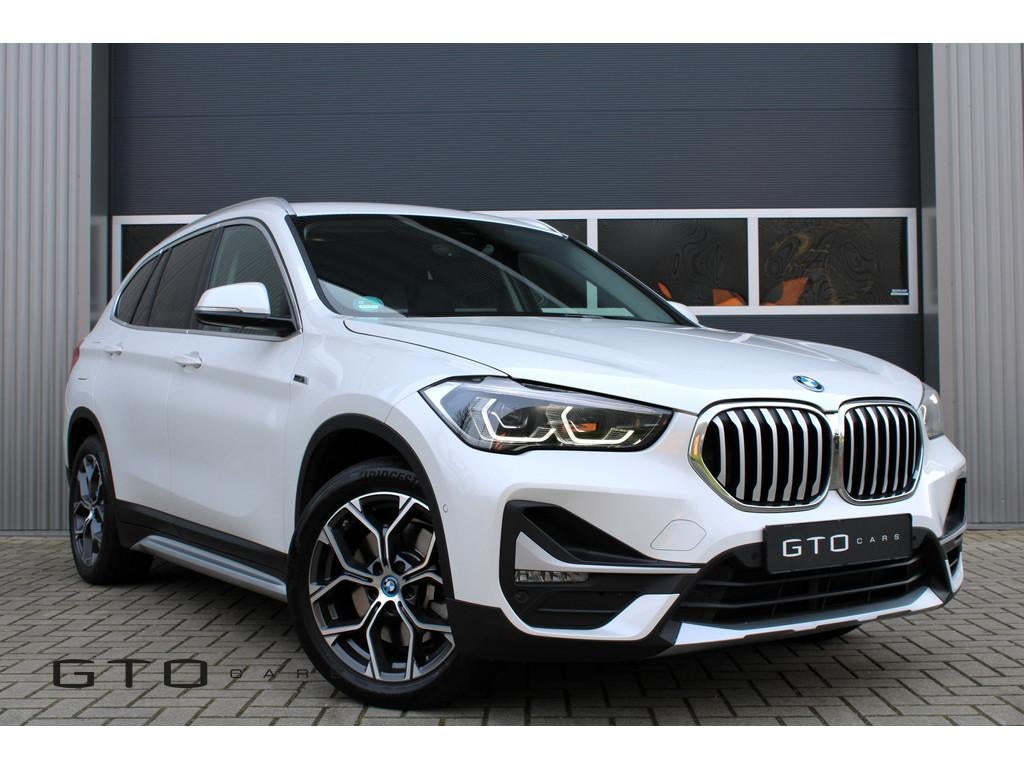 BMW X1 xDrive25e | LED | Getint Glas | Camera | Trekhaak, Gebruikt, Leder en Stof, Wit, 59 km/l