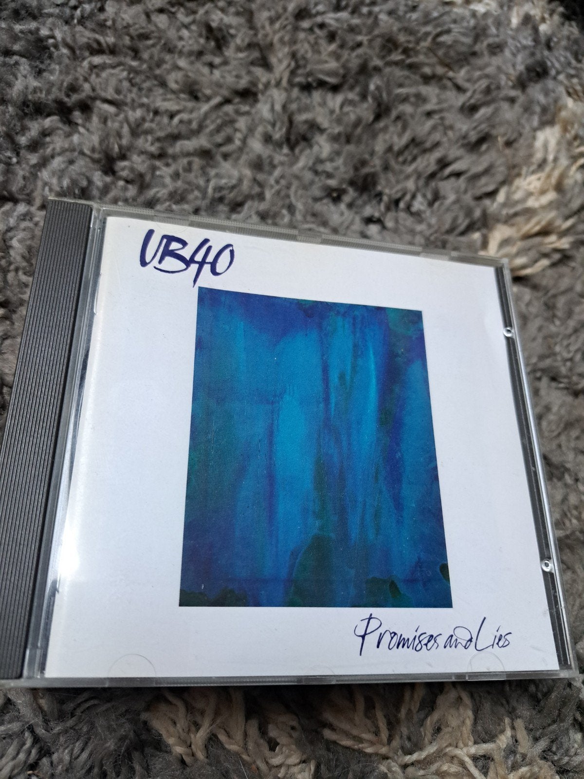 cd UB40 promises and lies, Ophalen, Zo goed als nieuw