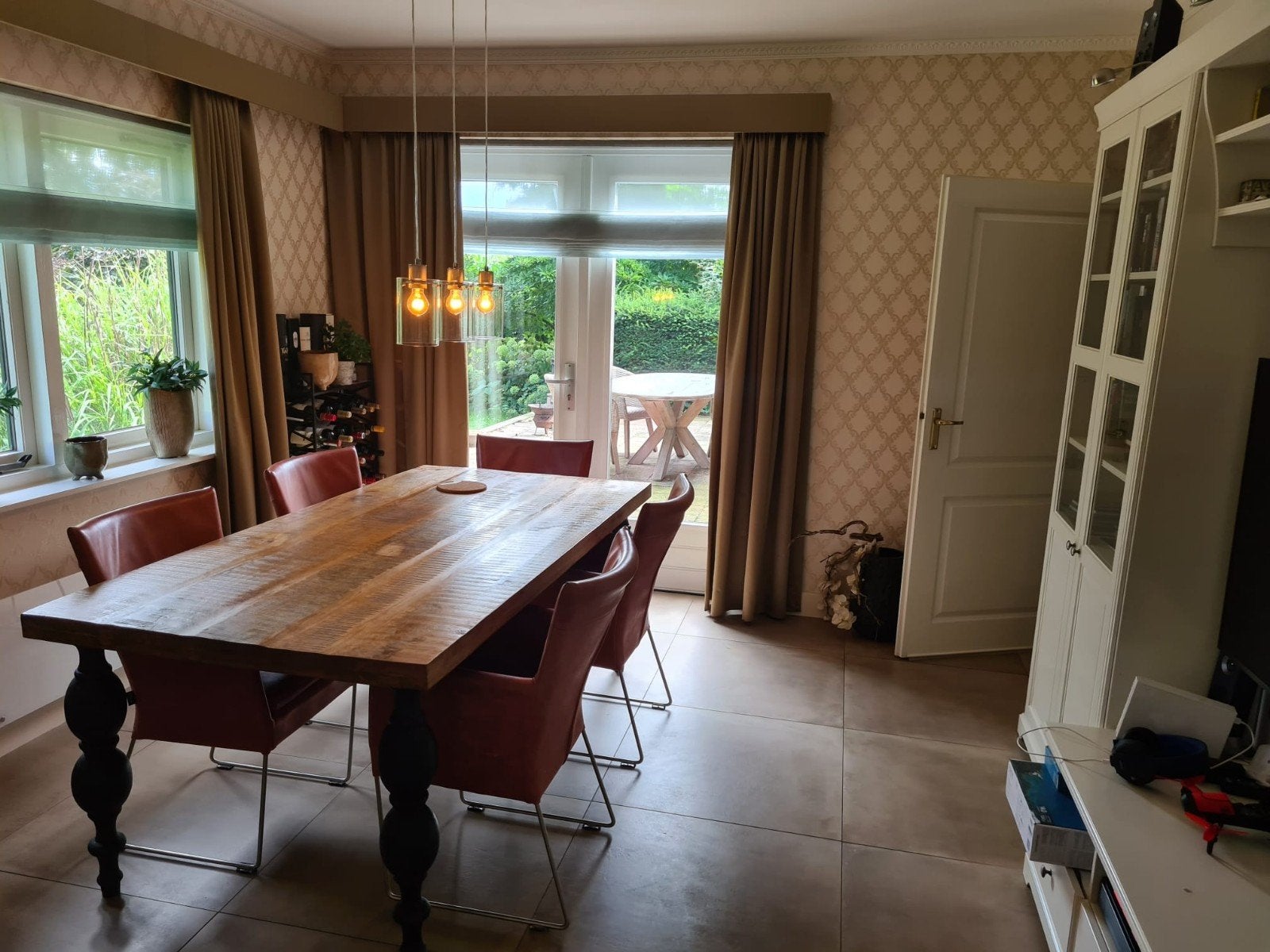 Eettafel van mango hout en bolpoten., Ophalen, 50 tot 100 cm, Zo goed als nieuw, Vijf personen of meer