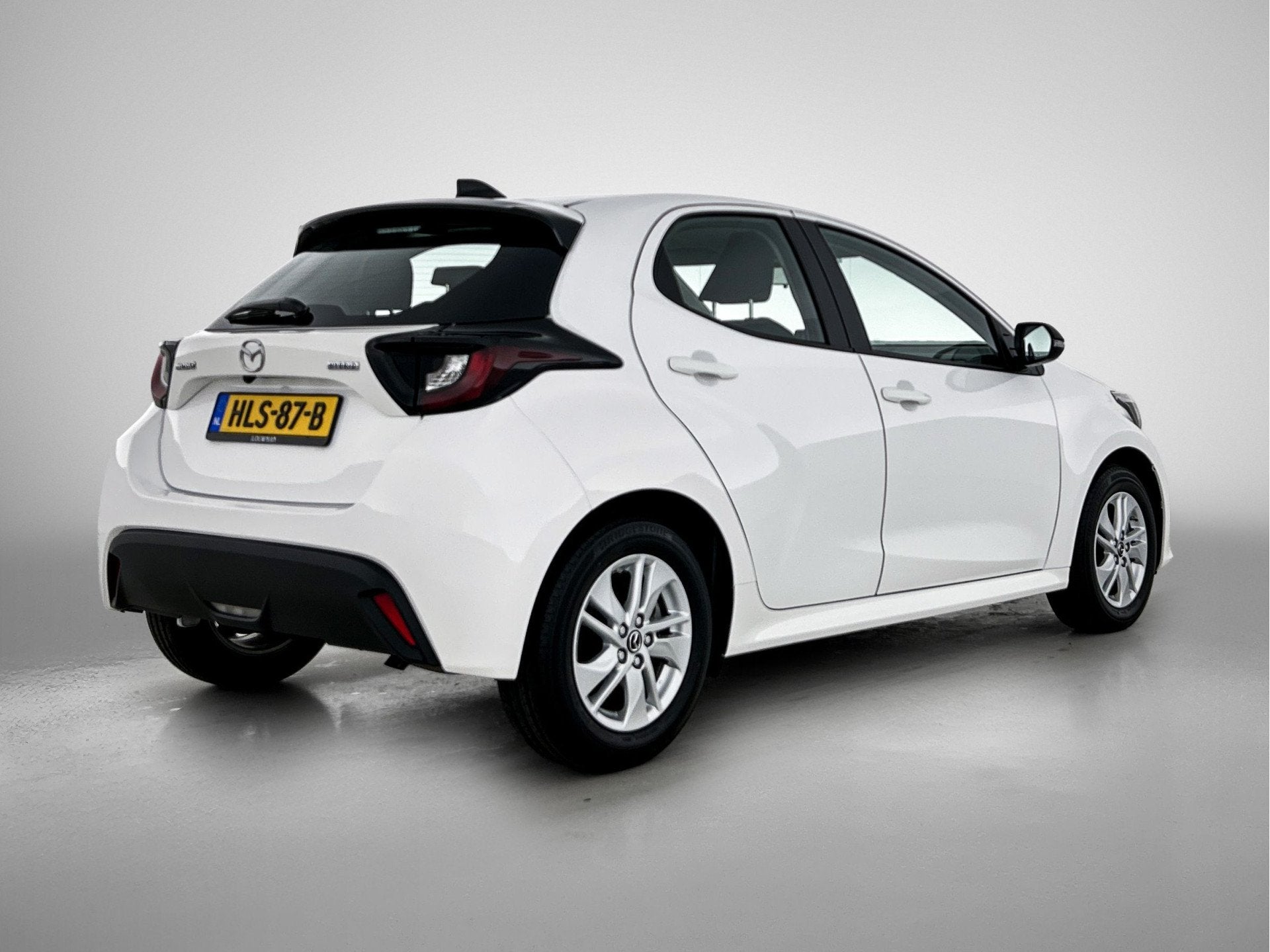 Mazda 2 Hybrid 1.5 Centre-line | Stoelverwarming | Camera |, Auto's, 12 maanden, Gebruikt, Wit, Bedrijf