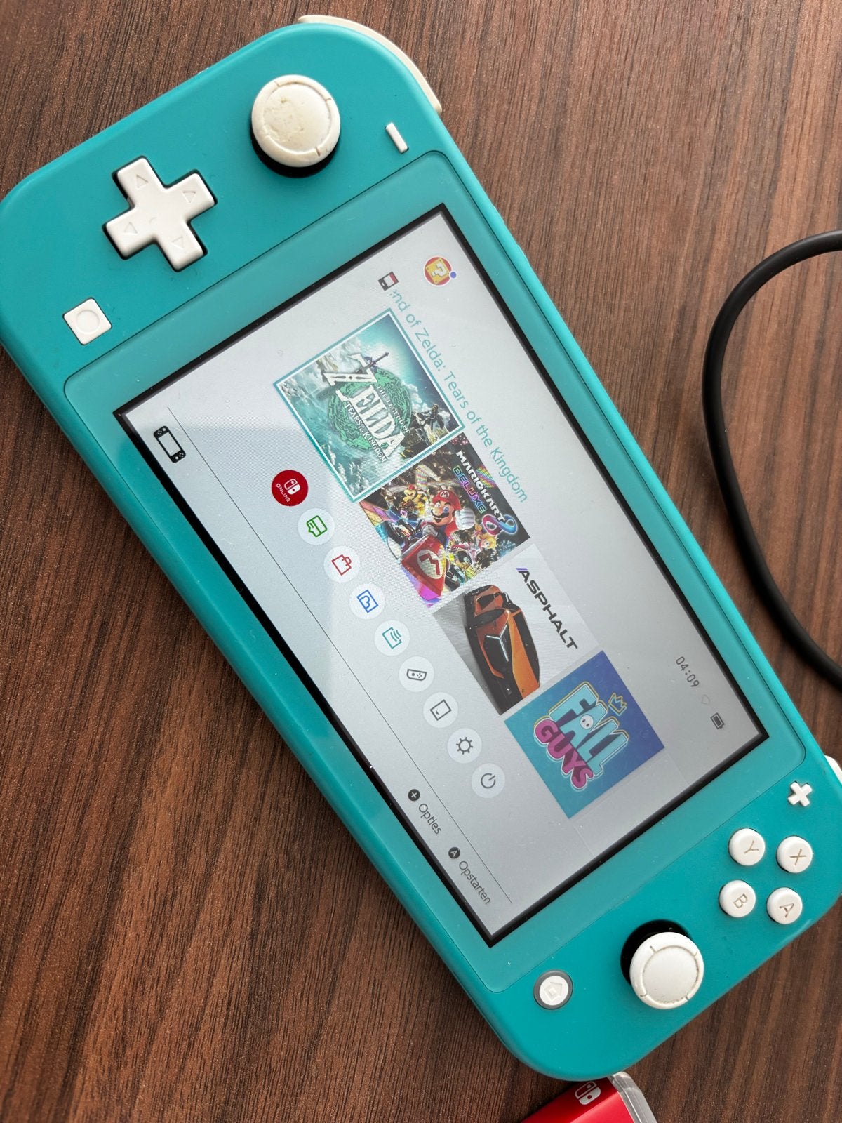 Nintendo Switch Lite Turquoise + Zelda Tears of the Kingdom, Spelcomputers en Games, Ophalen, Turquoise, Gebruikt