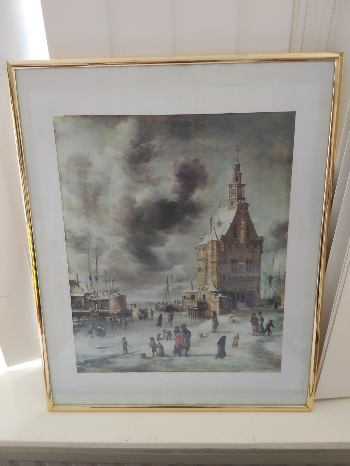 Gouden lijst met schilderij De stadspoort van Hoorn, Ophalen