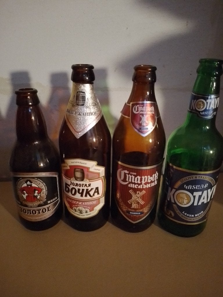 set van 4 lege Russische bierflessen, Verzamelen, Biermerken, Ophalen of Verzenden, Gebruikt, Flesje(s), Overige merken