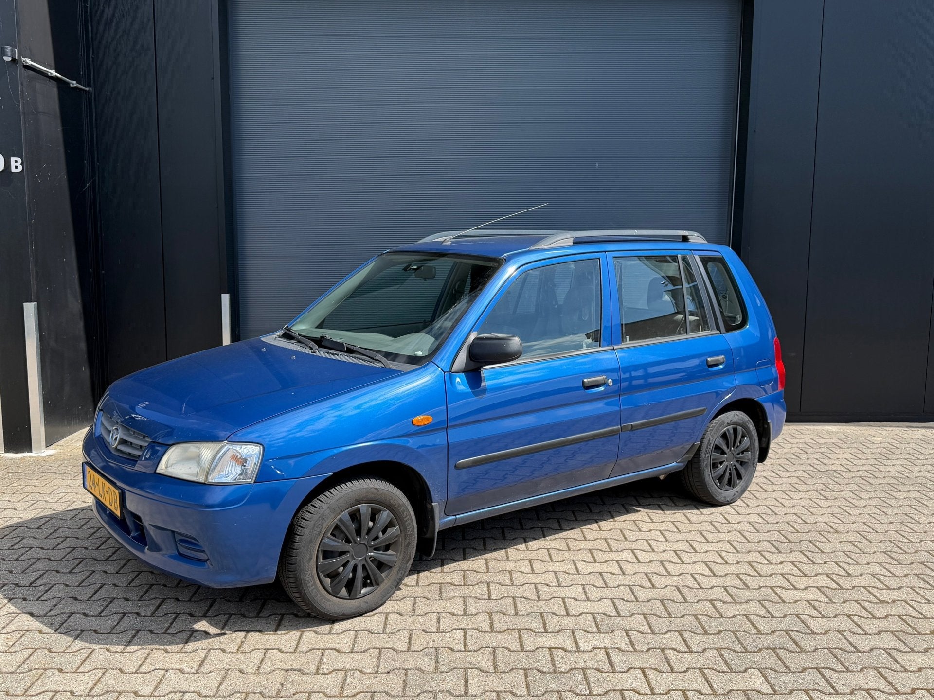 Mazda Demio 1.5 Exclusive export, Voorwielaandrijving, Blauw, Handgeschakeld, Grijs