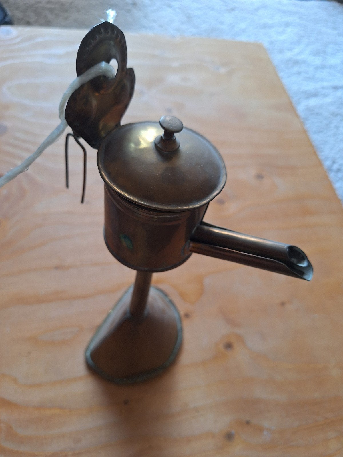Antieke koperen olielamp, Ophalen
