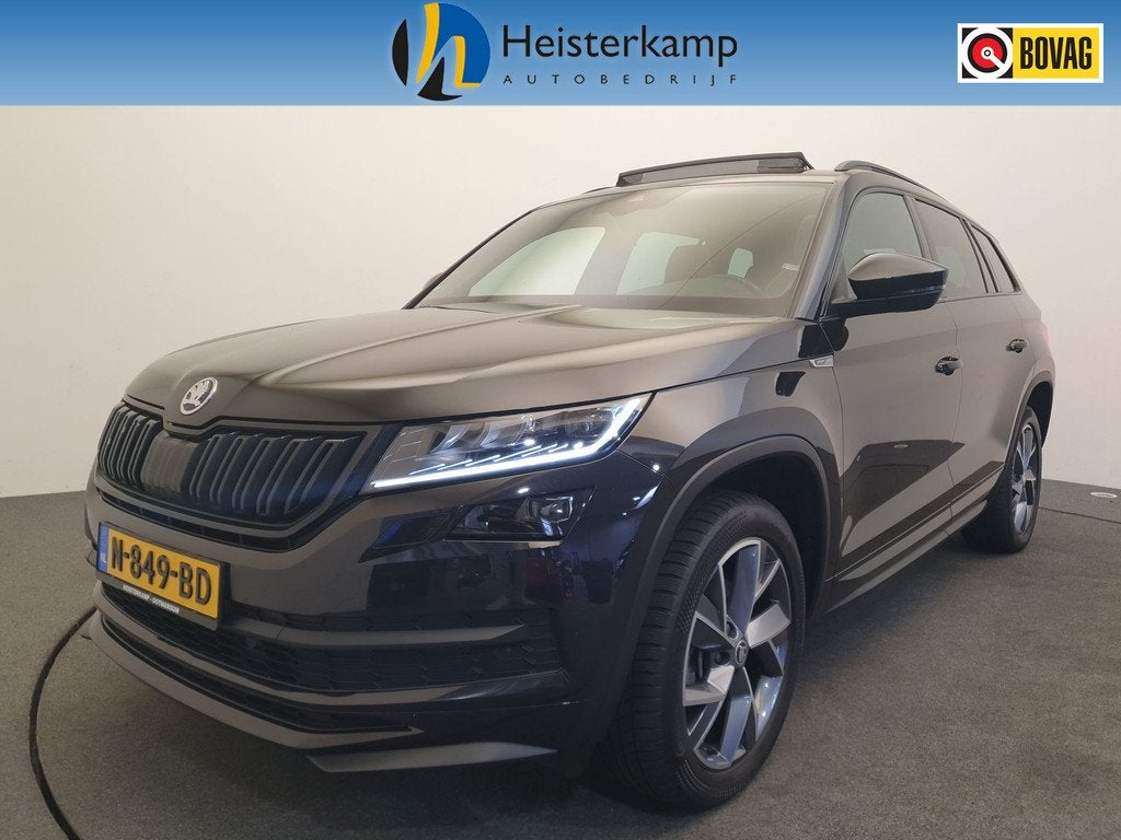 Skoda Kodiaq 1.5 TSI 150pk DSG/AUT Sportline Business 7p. Pa, Auto's, Skoda, 12 maanden, 4 cilinders, Zwart, Automatische klimaatregeling