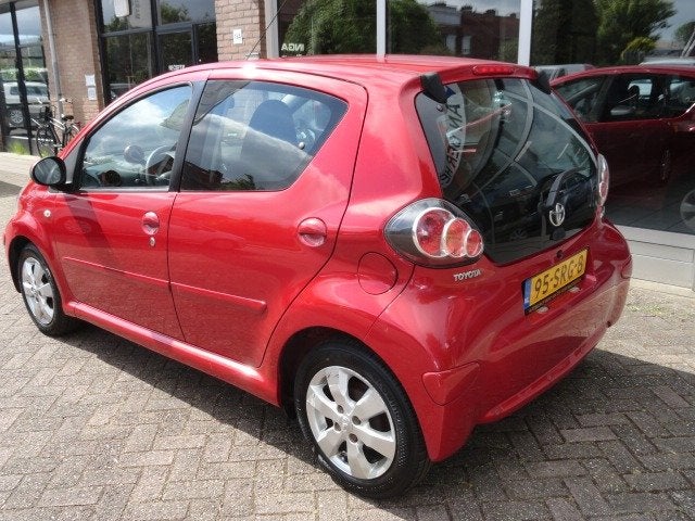 Toyota Aygo 1.0-12V Aspiration Red Navigator Airco, Voorwielaandrijving, Euro 5, Stof, Gebruikt