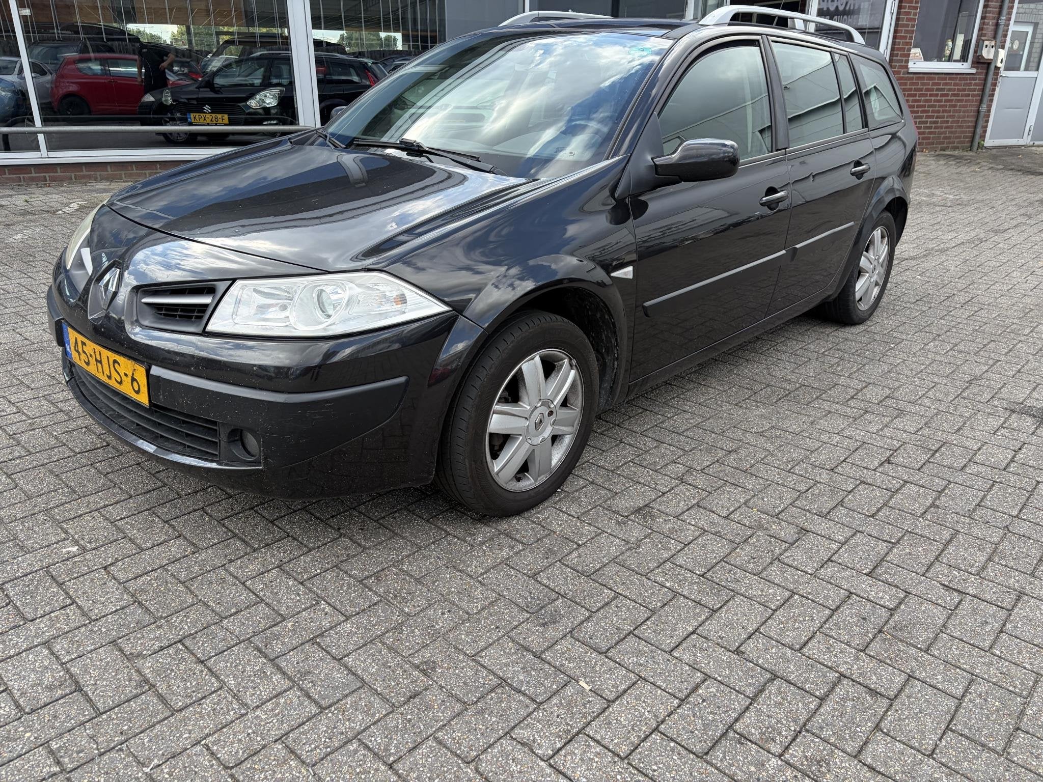 Renault Mégane Grand Tour 1.5 dCi Sélection Business, Auto's, Stof, Gebruikt, 4 cilinders, Zwart