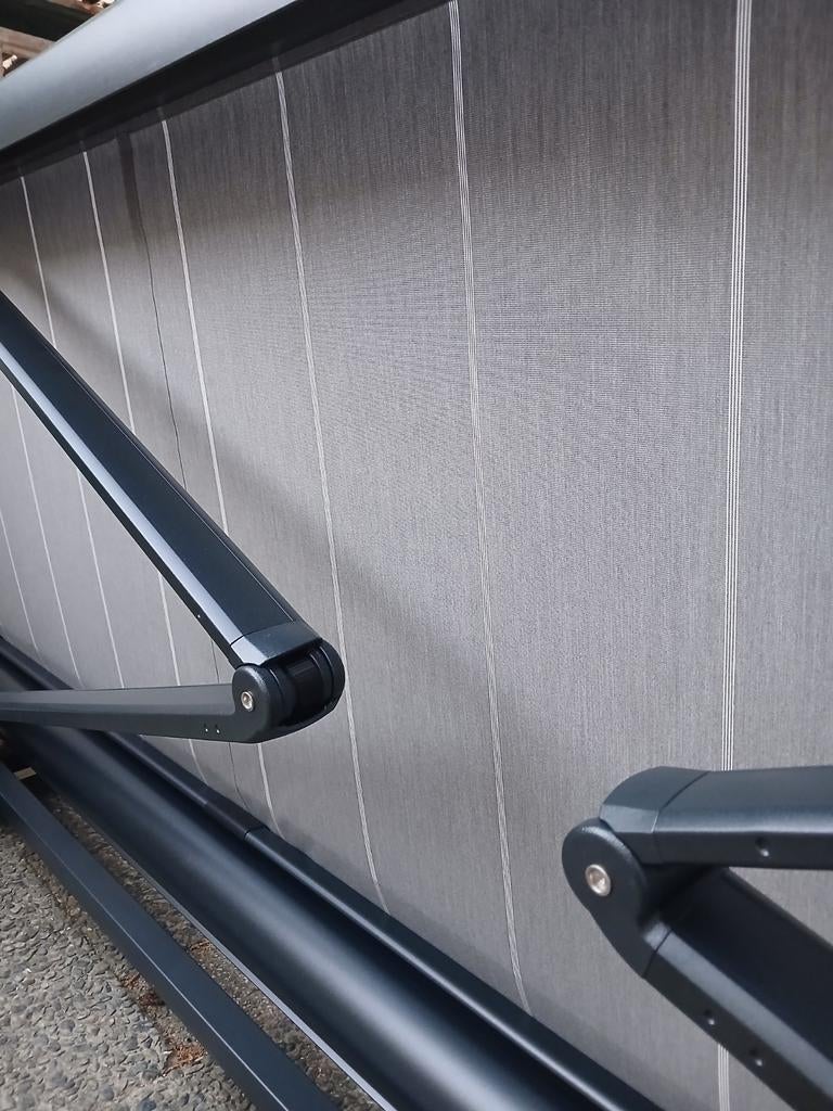 nieuw knikarmscherm luxaflex 340 x 260 elechtrisch., Ophalen, 200 cm of meer, Nieuw, Grijs