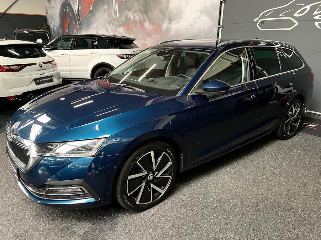 Skoda Octavia Combi 1.4 TSI Style iV Hybride 204 PK APPLE CA, Gebruikt, Zwart, Blauw, 1500 kg