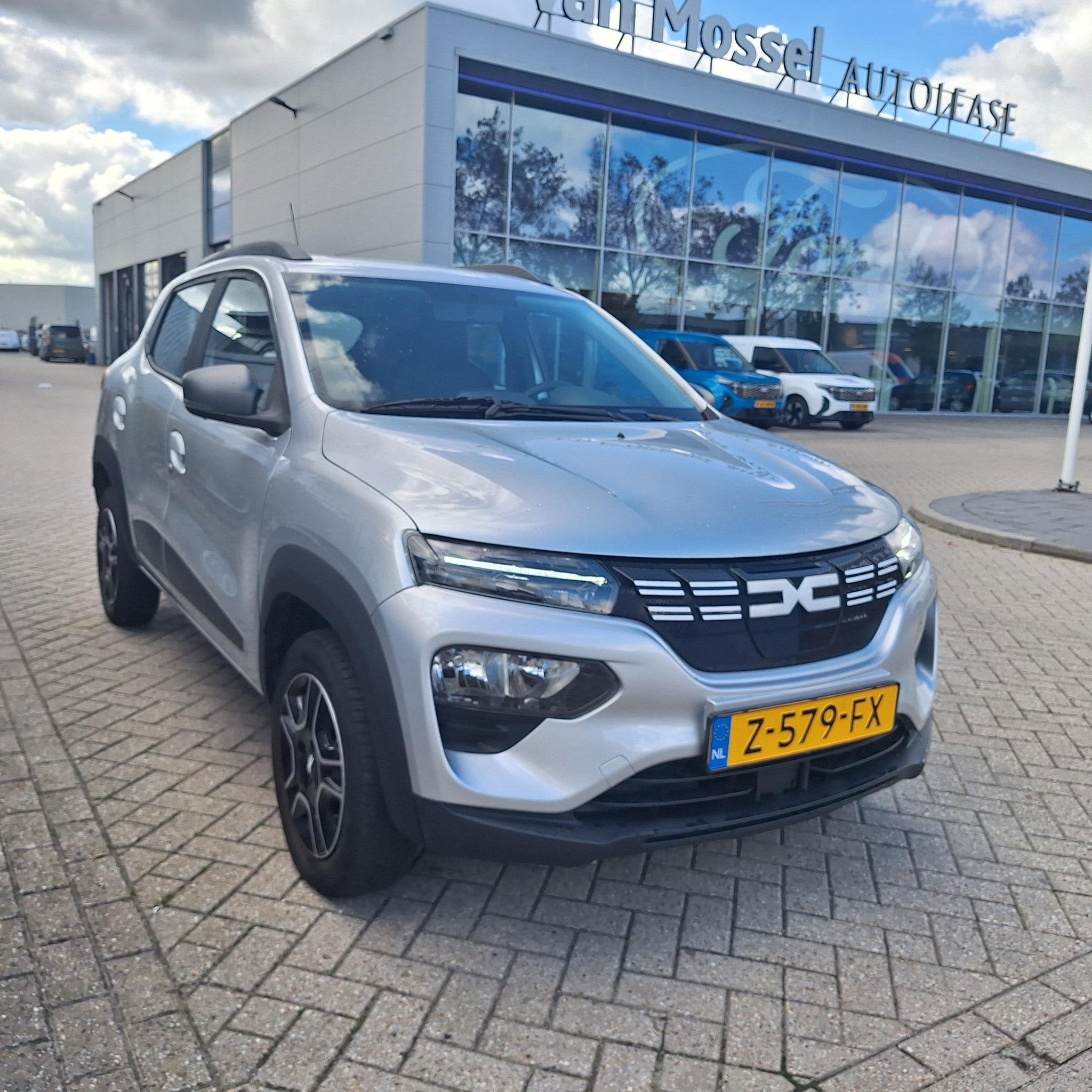 Dacia Spring Expression 27 kWh | SOH 92% | Navigatie | All W, 12 maanden, Gebruikt, Parkeersensor, Ford A1 Occasion