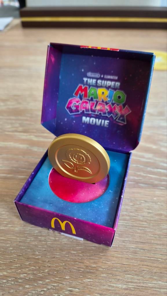 McDonald's Super Mario Galaxy Movie munt - Vuurbloem, Ophalen of Verzenden, Nieuw