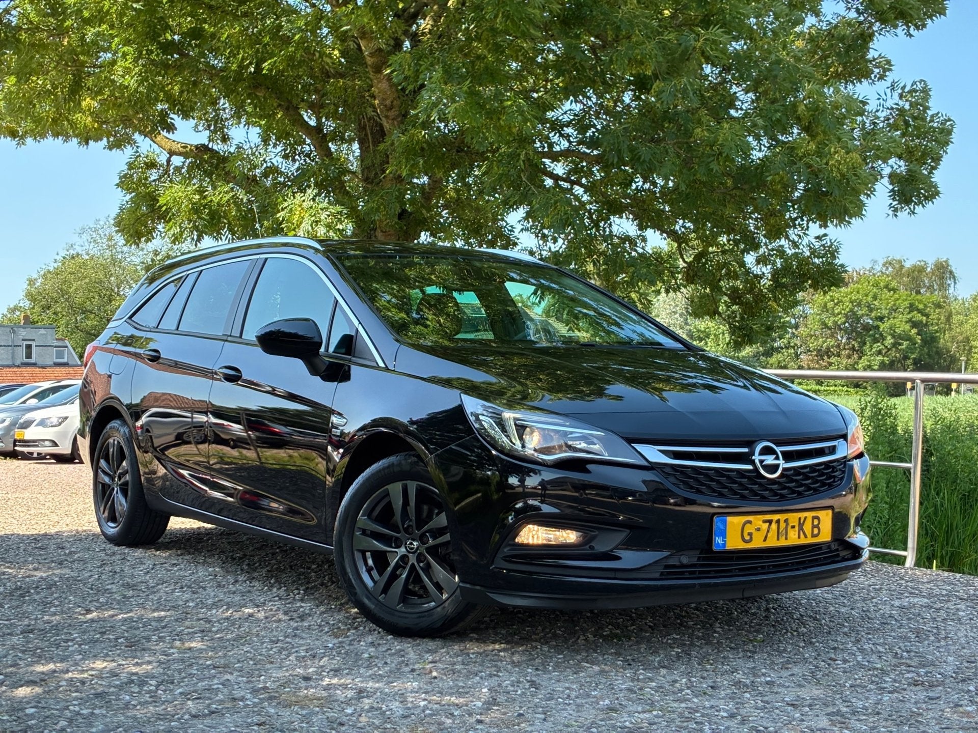 Opel Astra Sports Tourer 1.0 Turbo 120 Jaar Edition | Navi +, Stof, Gebruikt, 1178 kg, 620 kg
