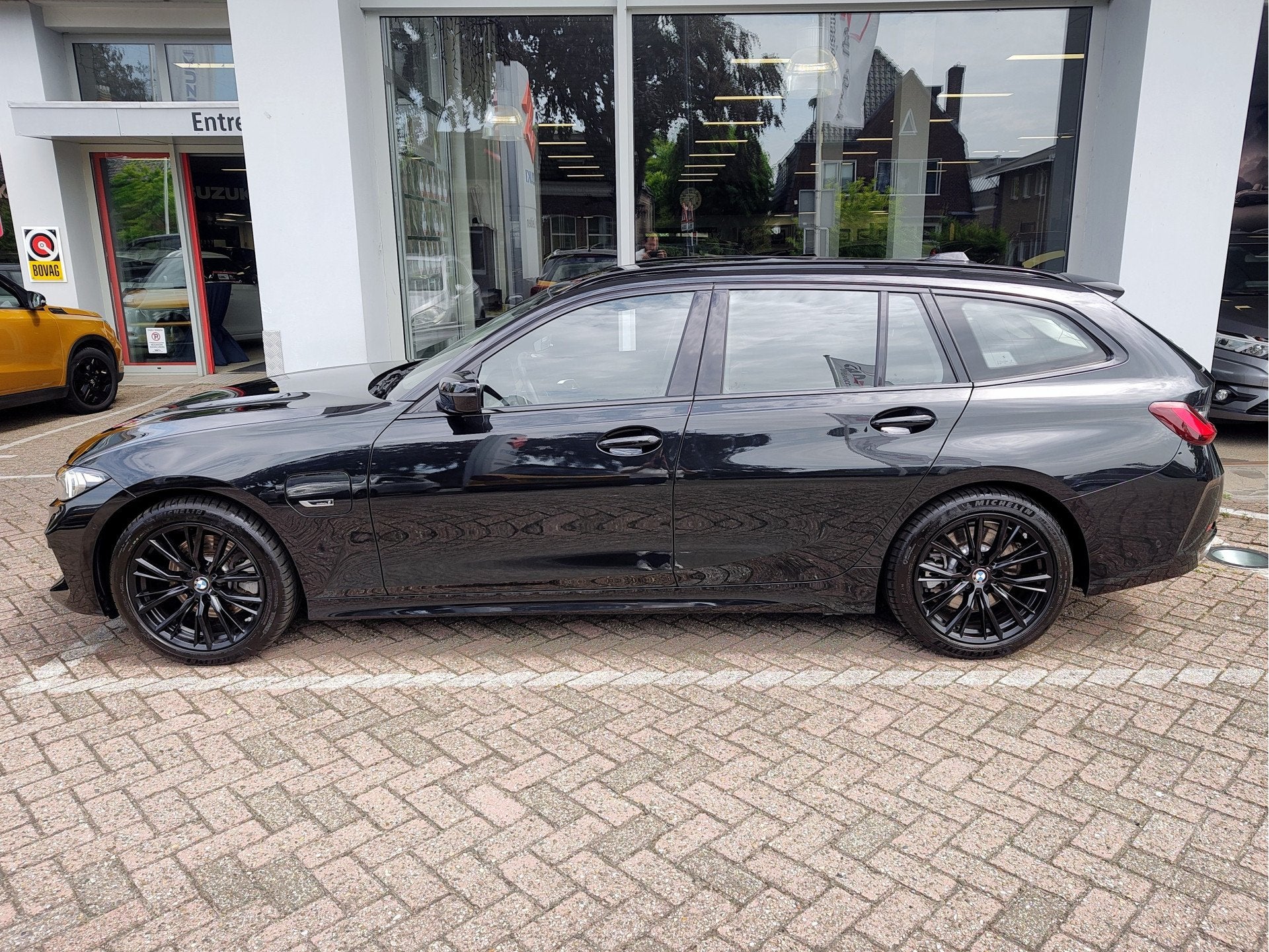 BMW 3 Serie Touring 320e PHEV Leder | Park Assist | Carplay/, Automaat, Gebruikt, 4 cilinders, Zwart