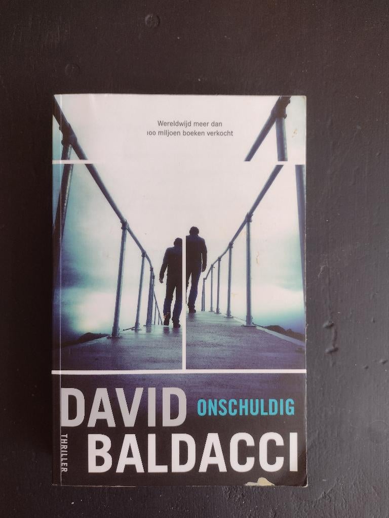 David Baldacci, Onschuldig, Boeken, Ophalen of Verzenden, Gelezen, David Baldacci