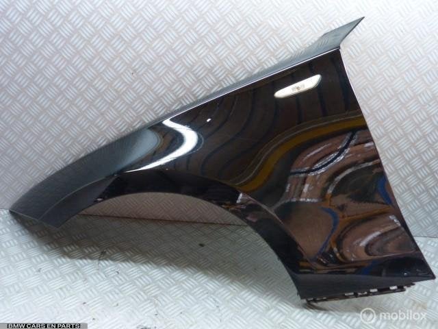 Spatbord links BMW 1-serie E87 E81 E88 E82 zwart 668 zwart 2, Gebruikt, Ophalen of Verzenden, BMW, BMW