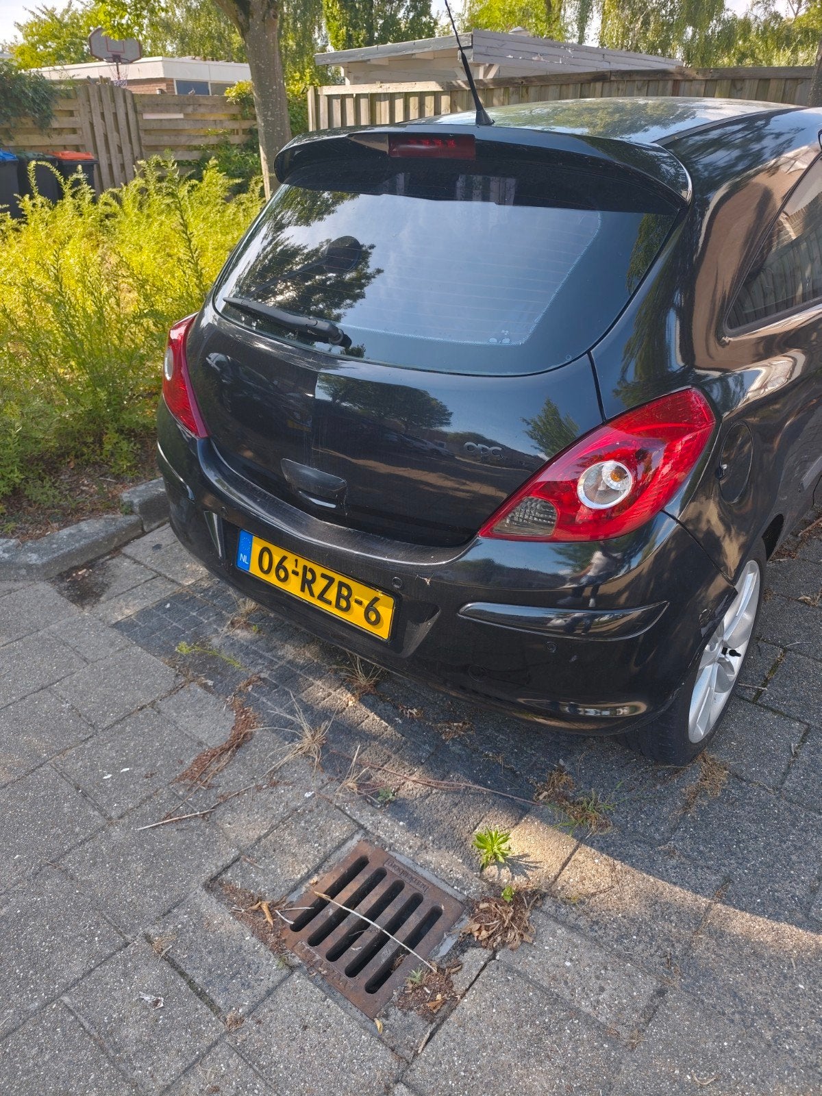 Opel Corsa 1.2 16V 3D 2011 Zwart OPC spoiler, Voorwielaandrijving, 40 €/maand, Zwart, 1229 cc