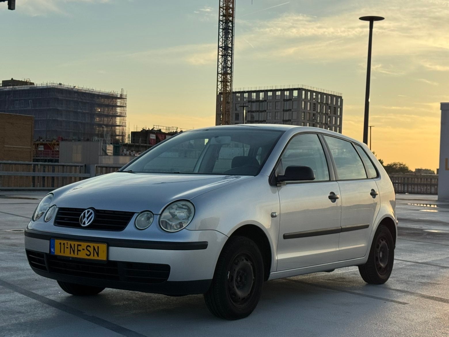 Volkswagen Polo 1.4 55KW 2003 Grijs, Voorwielaandrijving, Zwart, 4 cilinders, Origineel Nederlands