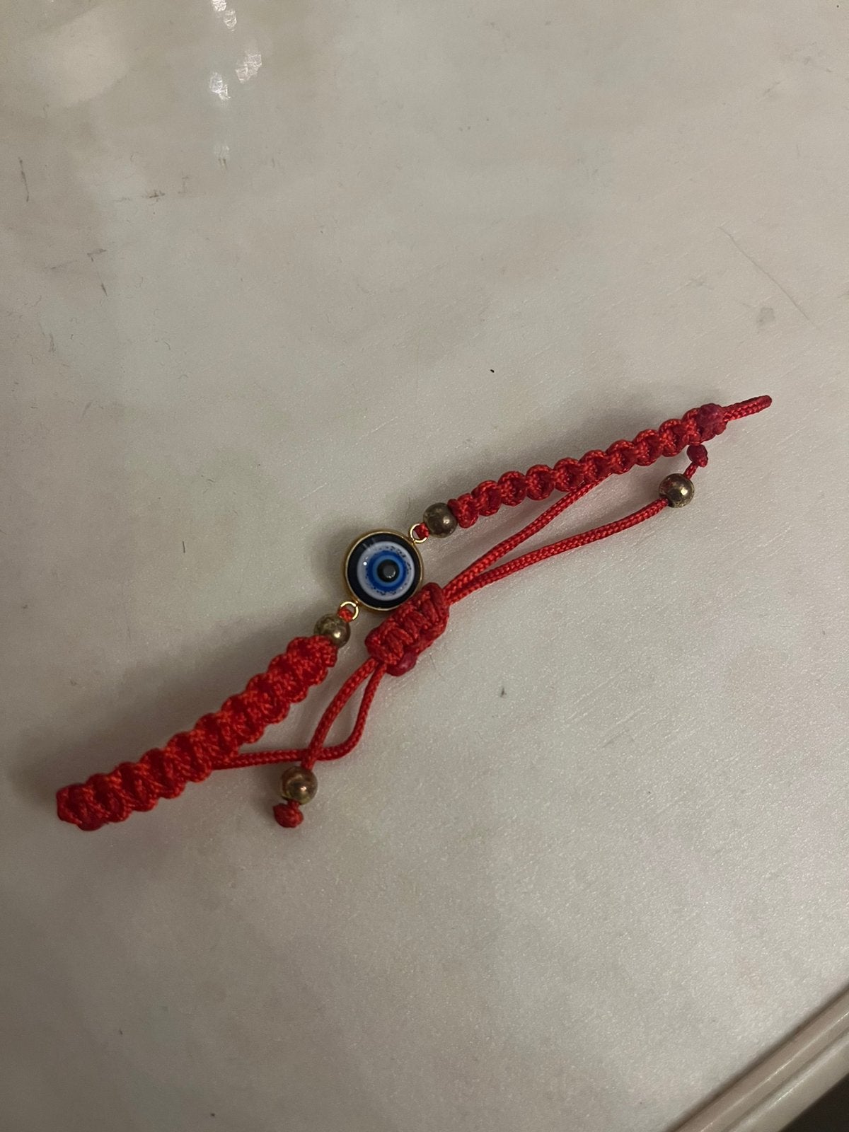 Oog armband, Overige materialen, Ophalen of Verzenden, Zo goed als nieuw, Met bedels of kralen