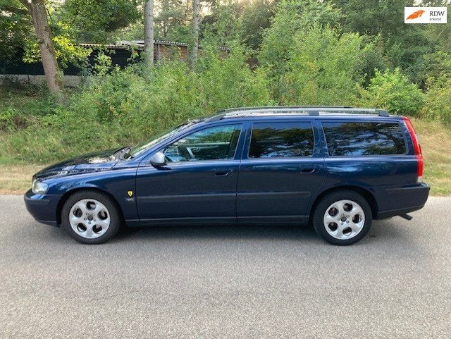 Volvo V70 2.4 AUT Airco Navi PDC Trekhaak, Auto's, Volvo, Blauw, Leder en Stof, Grijs, 129 €/maand