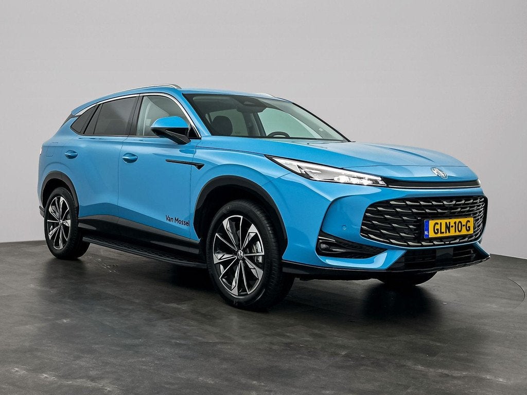 MG HS PHEV 1.5 272pk Aut. Luxury | 100km Electrisch | Navi |, Auto's, MG, 12 maanden, Stof, 4 cilinders, Blauw
