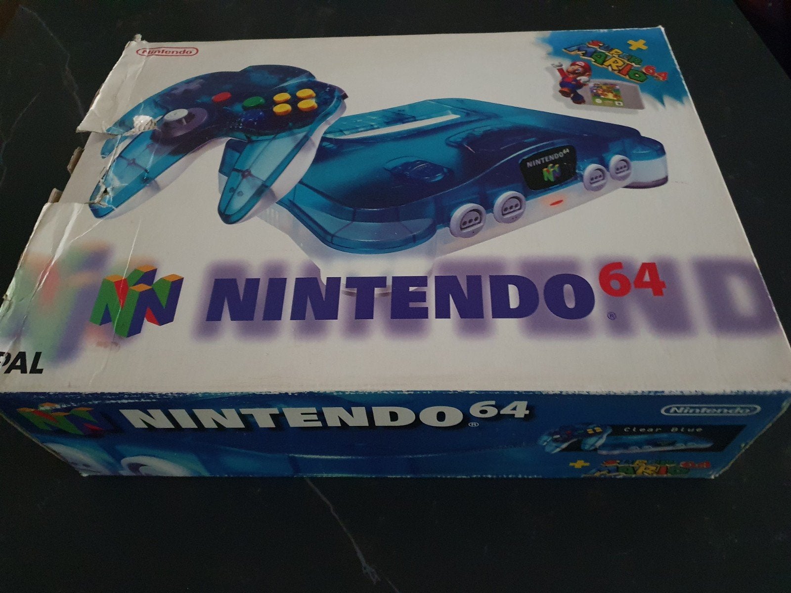 Nintendo 64 - Clear Blue, Spelcomputers en Games, Ophalen of Verzenden, Zo goed als nieuw, Met 1 controller, Met games