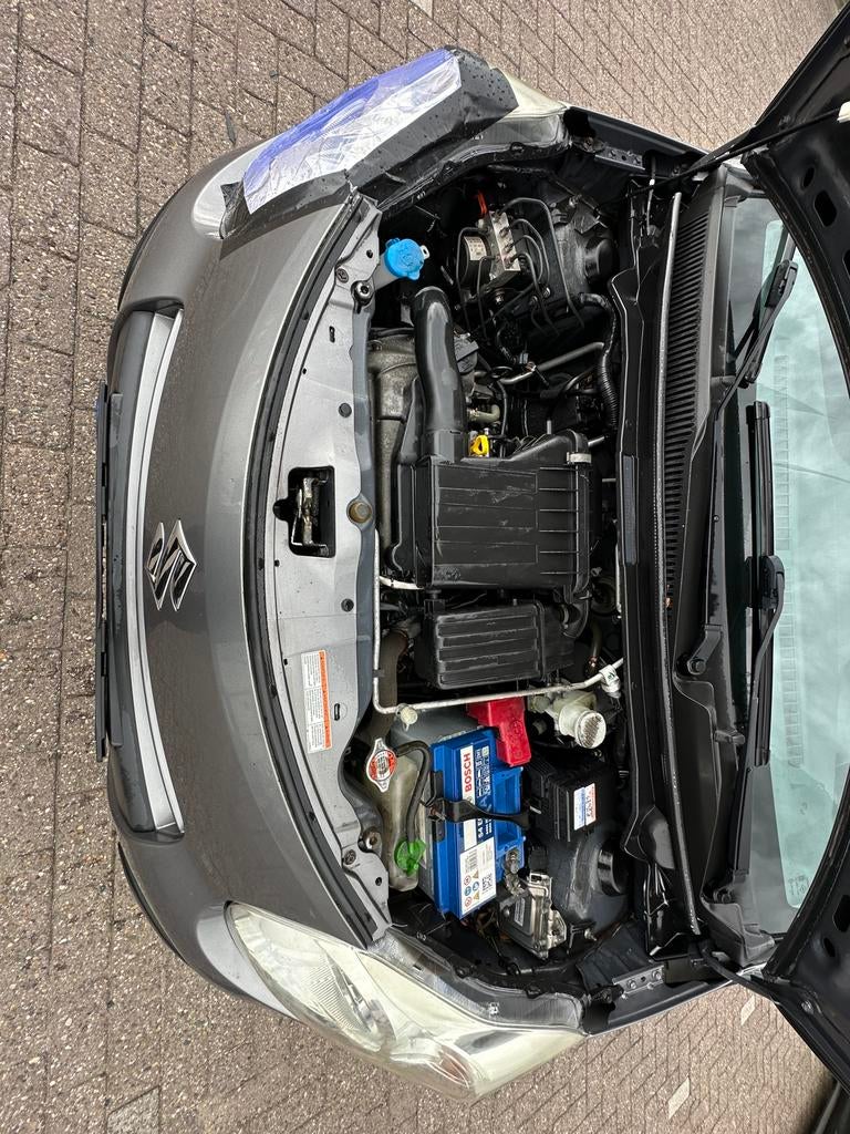 Suzuki Alto 1.0 2013 Grijs, Auto's, Voorwielaandrijving, 200 kg, 4 stoelen, Origineel Nederlands