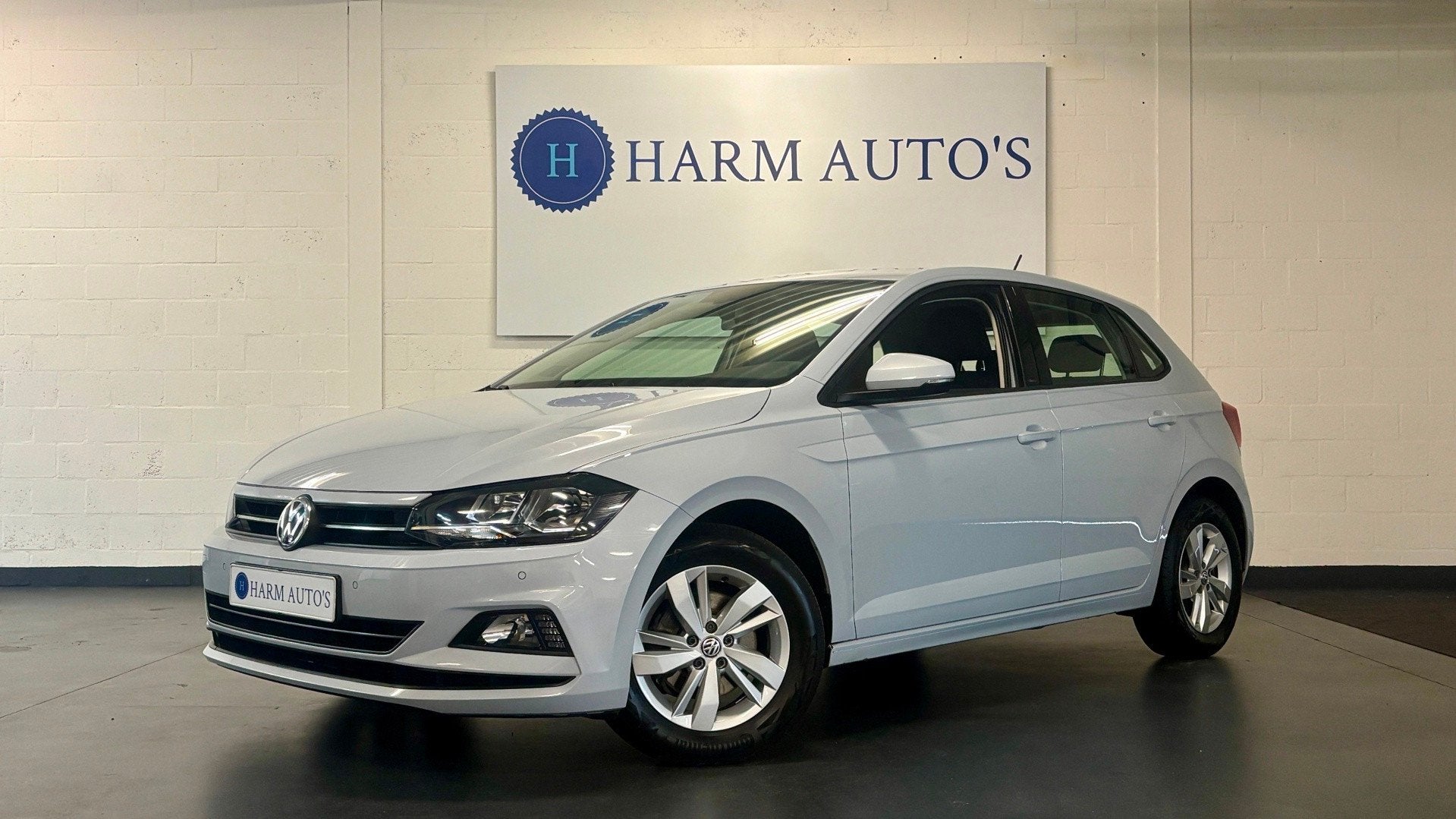 Volkswagen Polo 1.0 TSI Comfortline 116pk Clima / PDC / Navi, Gebruikt, 116 pk, Wit, Origineel Nederlands