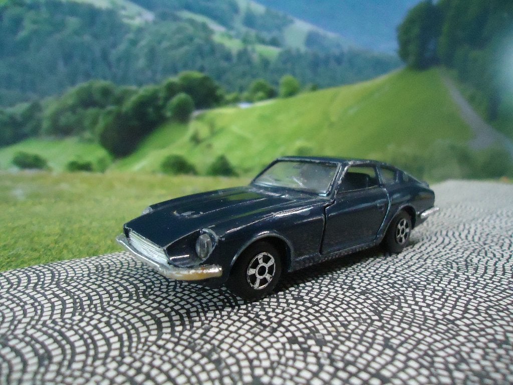 1/43 Datsun / Nissan 240Z - Polistil E64 i.z.g.st., Hobby en Vrije tijd, Modelauto's | 1:43, Ophalen of Verzenden, Gebruikt, Auto