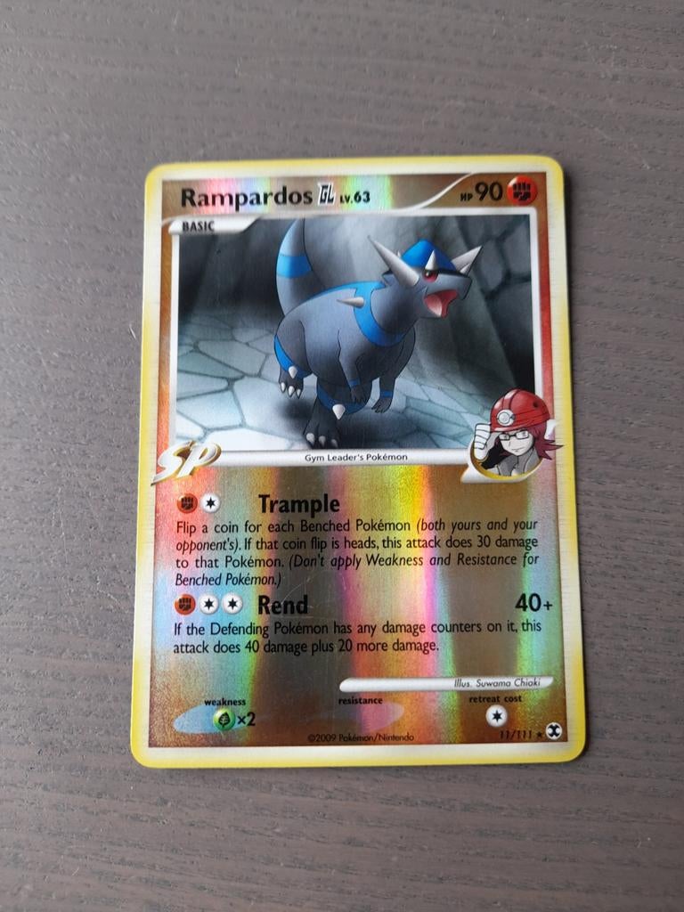 2009 rising rivals 11/111 rampardos reverse, Ophalen of Verzenden, Gebruikt, Losse kaart, Foil