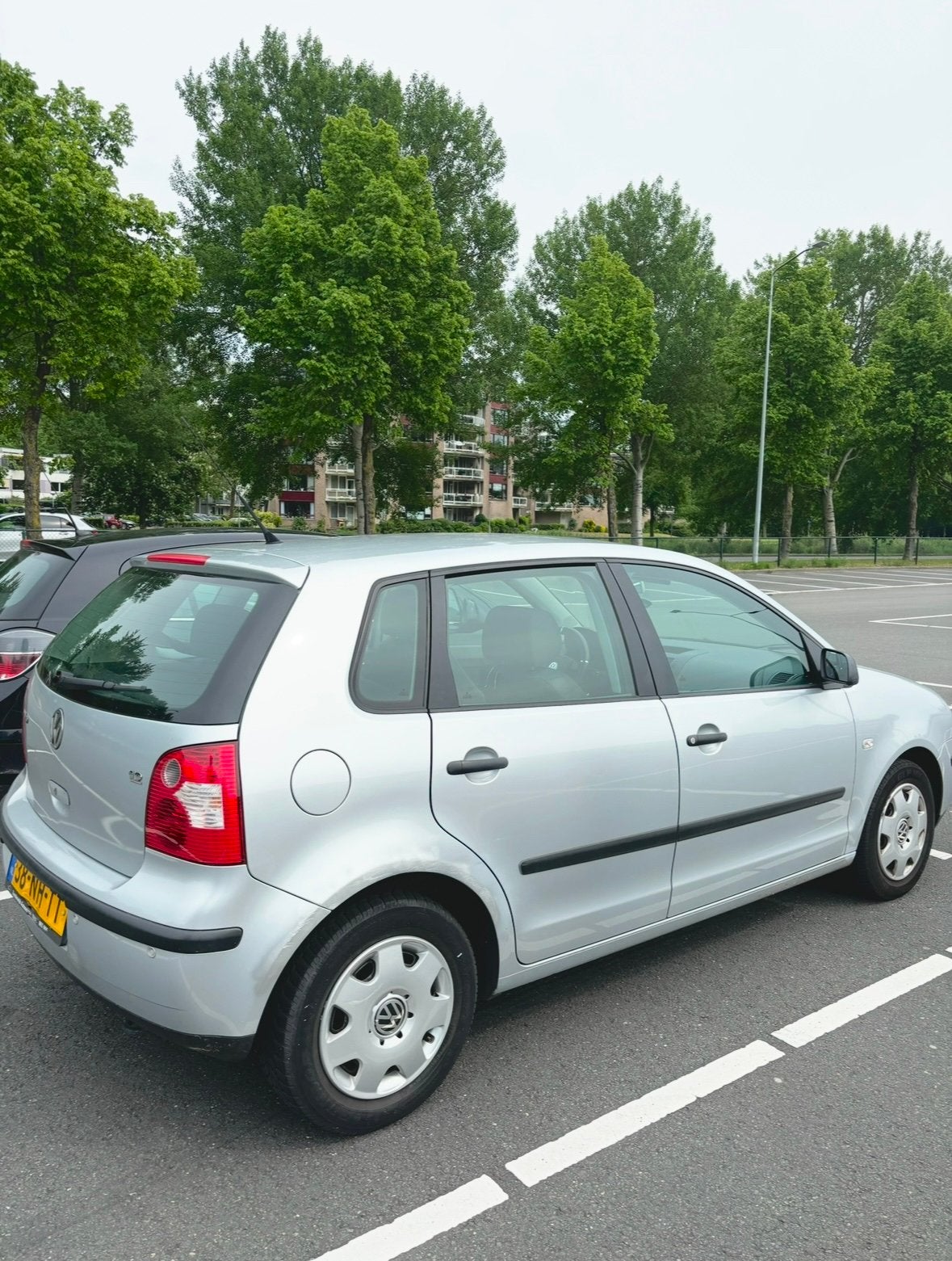 Volkswagen Polo 1.2 47KW 2003 Grijs, Auto's, Volkswagen, 1198 cc, Origineel Nederlands, Handgeschakeld, Grijs