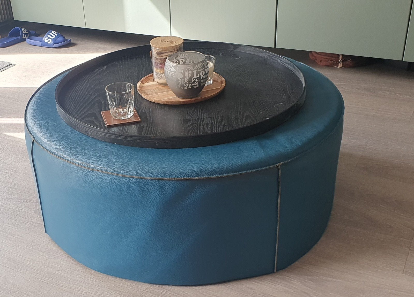 Poef of hocker salontafel in goede staat., Ophalen, Zo goed als nieuw, Rond, Leer